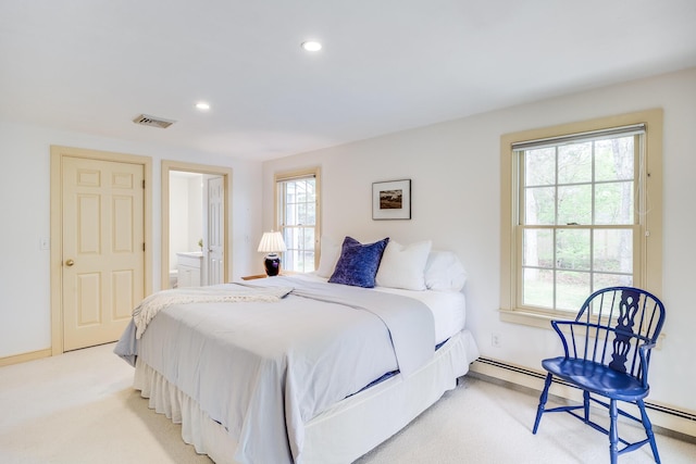 bedroom featuring recessed lighting, multiple windows, light colored carpet, and baseboards