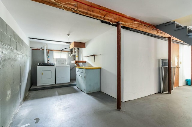 basement featuring separate washer and dryer