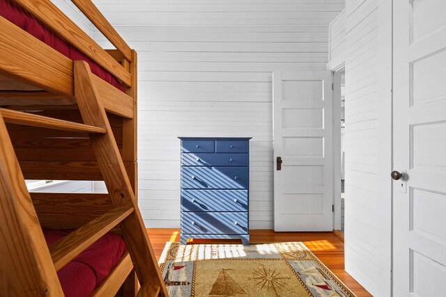 corridor featuring wood finished floors