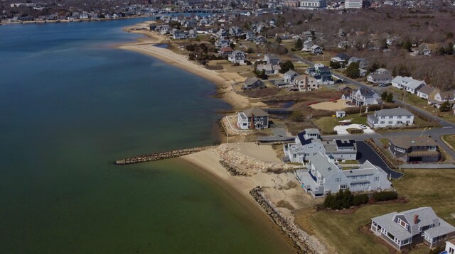 bird's eye view featuring a residential view and a water view