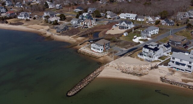 bird's eye view featuring a residential view and a water view
