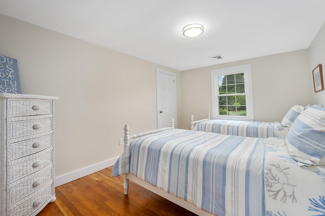 69 Joan Rd, Centerville, MA 02632 - bedroom with wood finished floors and baseboards
