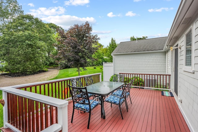 69 Joan Rd, Centerville, MA 02632 - wooden deck featuring outdoor dining area and a lawn