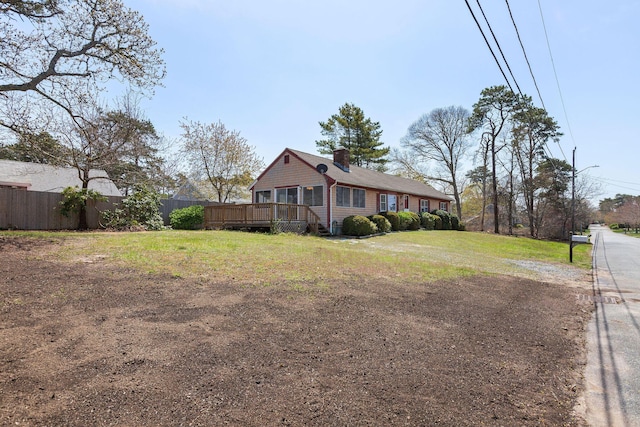 view of yard featuring a wooden deck