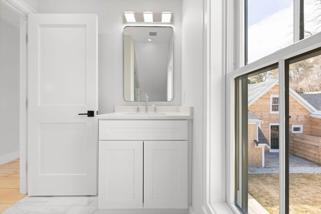 540 S Orleans Rd, Orleans, MA 02653 - bathroom featuring vanity and marble finish floors