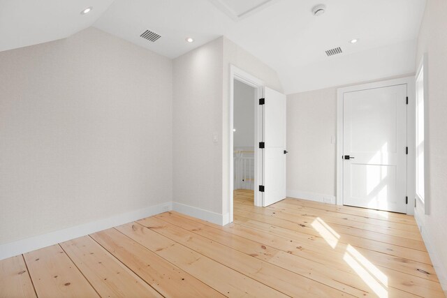 540 S Orleans Rd, Orleans, MA 02653 - unfurnished room with light wood-style flooring, lofted ceiling, a smoke detector, baseboards, and recessed lighting
