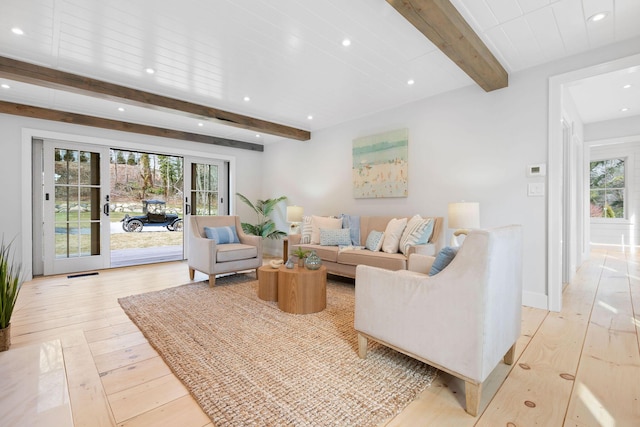 540 S Orleans Rd, Orleans, MA 02653 - living area featuring beamed ceiling, light wood finished floors, healthy amount of natural light, and recessed lighting