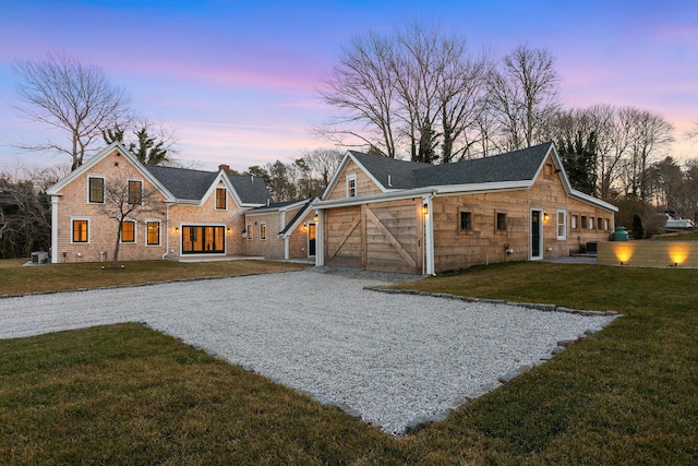540 S Orleans Rd, Orleans, MA 02653 - view of front of property featuring a front yard, roof with shingles, and gravel driveway
