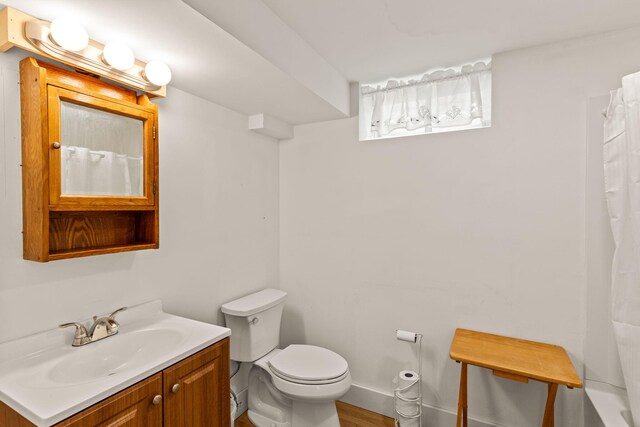 292 Stage Harbor Rd, Chatham, MA 02633 - full bathroom featuring toilet, curtained shower, and vanity