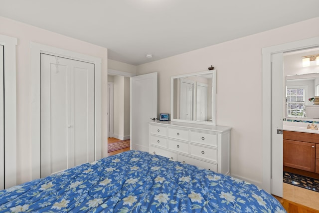 292 Stage Harbor Rd, Chatham, MA 02633 - bedroom with wood finished floors and a sink