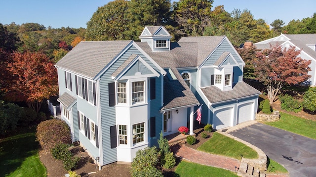 47 Stoney Pond Cir, Marstons Mills, MA 02648 - view of front of house with asphalt driveway and a garage