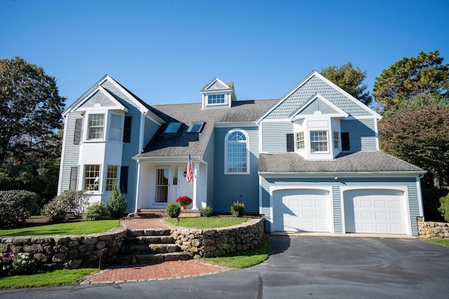 47 Stoney Pond Cir, Marstons Mills, MA 02648 - view of front of house featuring asphalt driveway, a garage, and roof with shingles