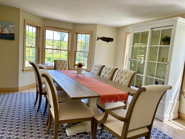 47 Stoney Pond Cir, Marstons Mills, MA 02648 - dining area featuring healthy amount of natural light, light wood finished floors, and baseboards