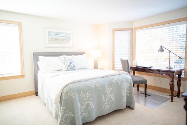 47 Stoney Pond Cir, Marstons Mills, MA 02648 - carpeted bedroom with multiple windows and baseboards