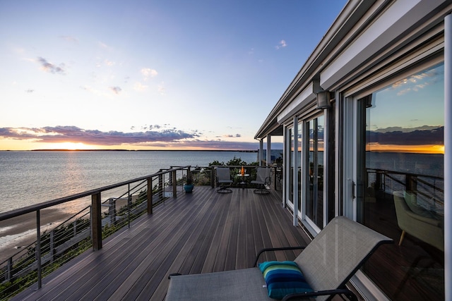 deck featuring a water view