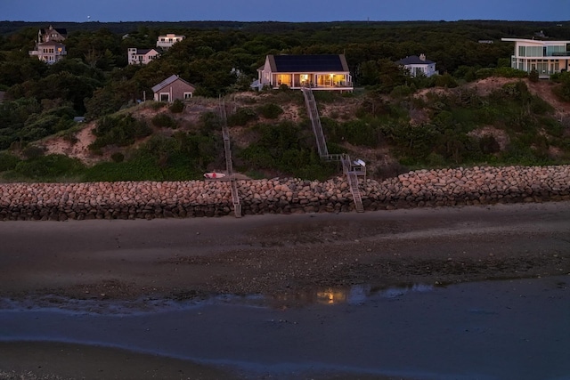 114 4th St, Wellfleet, MA 02667 - aerial view of property's location with a heavily wooded area and a large body of water