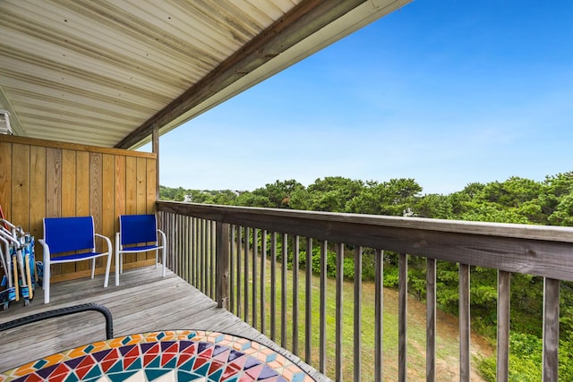 wooden balcony featuring a wooden deck