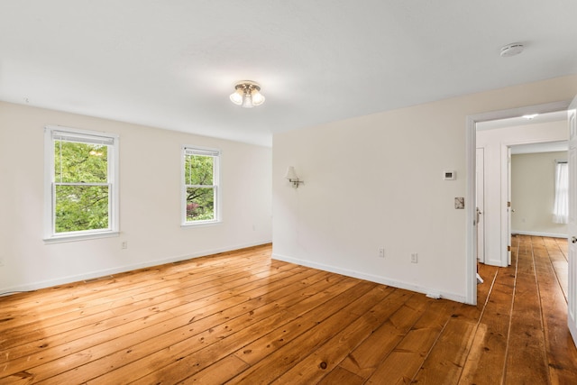 29 Windward Walk, Harwich Port, MA 02646 - empty room with wood-type flooring, a smoke detector, and baseboards
