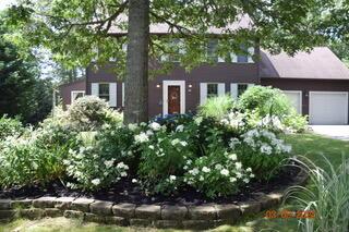 29 Windward Walk, Harwich Port, MA 02646 - view of front of house featuring driveway
