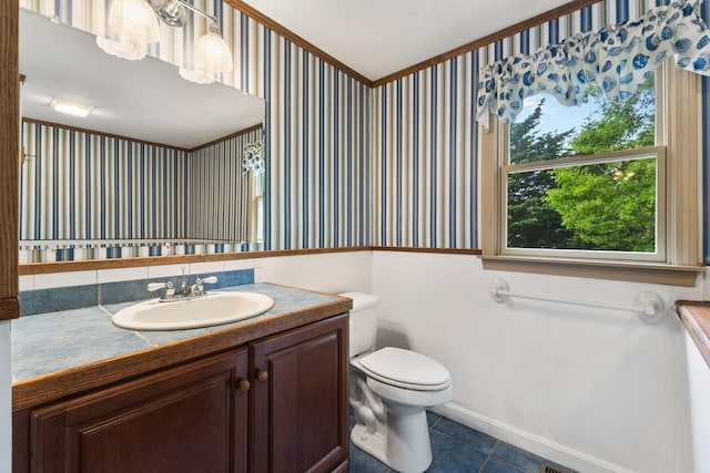 29 Windward Walk, Harwich Port, MA 02646 - bathroom featuring tile patterned floors, wallpapered walls, vanity, toilet, and baseboards