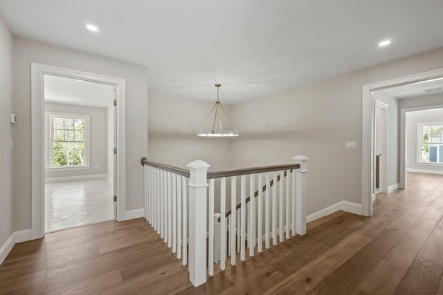 14 Azalea Ln, Mashpee, MA 02649 - hallway featuring an upstairs landing, wood finished floors, recessed lighting, and baseboards