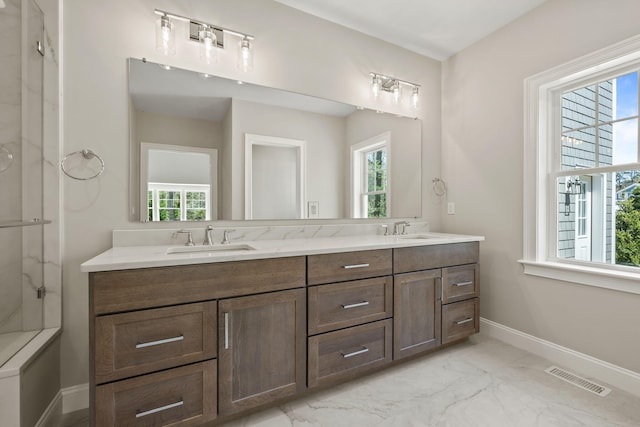 14 Azalea Ln, Mashpee, MA 02649 - full bath featuring marble look tiles, healthy amount of natural light, and double vanity