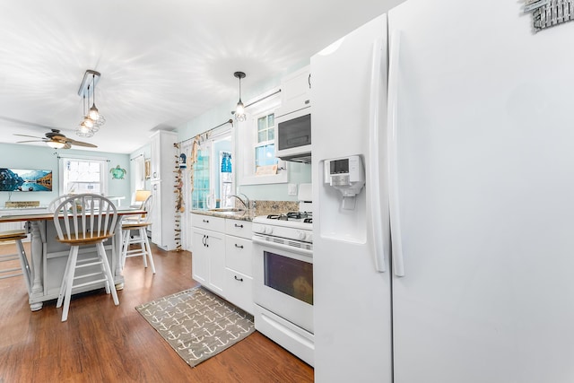 7 John St, Wareham, MA 02571 - kitchen featuring a sink, a ceiling fan, white cabinetry, white appliances, and dark wood-type flooring