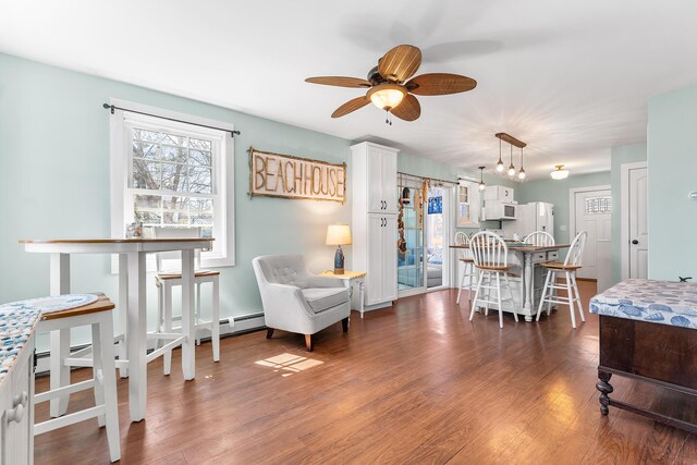 7 John St, Wareham, MA 02571 - dining area with ceiling fan and dark wood finished floors