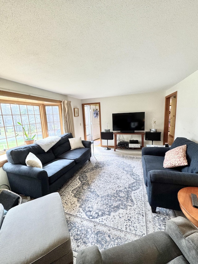34 Charles Rd, Harwich, MA 02645 - living area featuring a textured ceiling and carpet floors