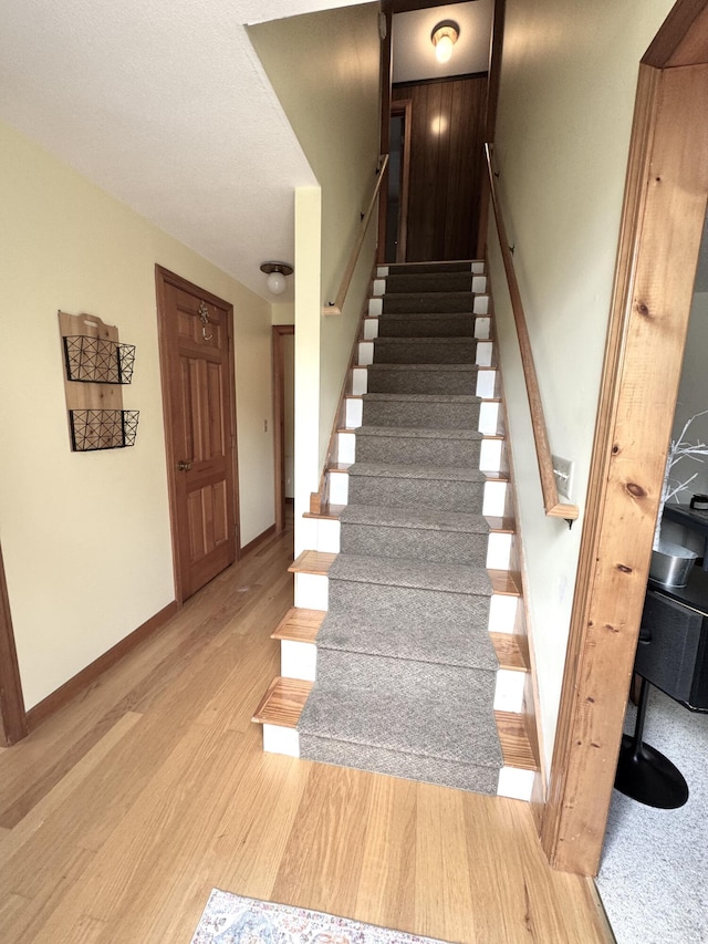 34 Charles Rd, Harwich, MA 02645 - staircase featuring wood finished floors and baseboards