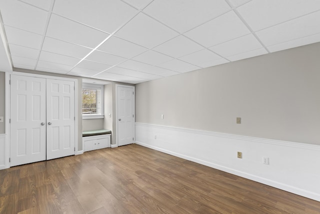29 Sturgis Ln, Barnstable, MA 02630 - unfurnished bedroom featuring wood finished floors, a paneled ceiling, and baseboards