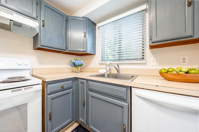 329 W Main St Unit 30, Hyannis, MA 02601 - kitchen with white appliances, exhaust hood, light countertops, and gray cabinetry