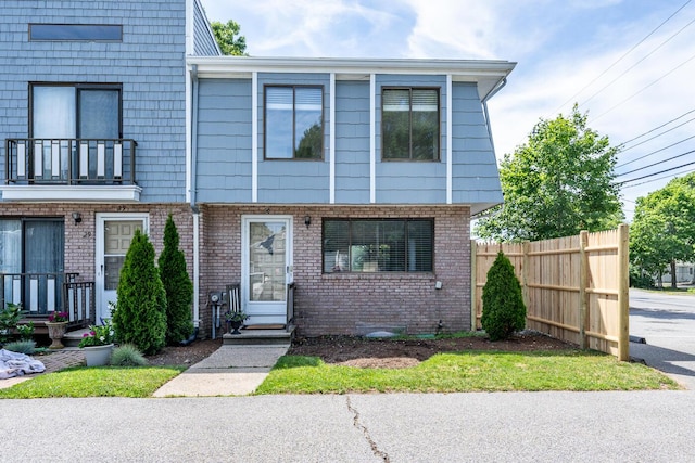 329 W Main St Unit 30, Hyannis, MA 02601 - townhome / multi-family property featuring brick siding
