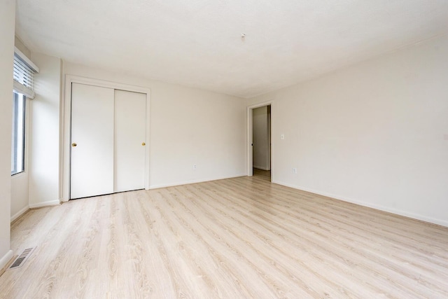 329 W Main St Unit 30, Hyannis, MA 02601 - unfurnished bedroom featuring light wood-style flooring and a closet