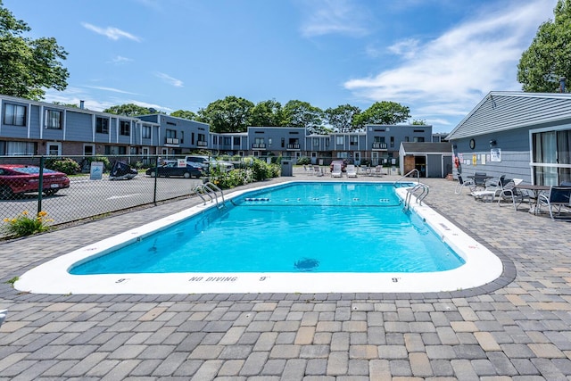 329 W Main St Unit 30, Hyannis, MA 02601 - community pool with a patio area and a residential view