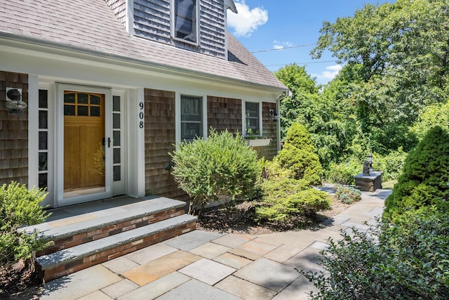 908 W Falmouth Hwy, Falmouth, MA 02540 - entrance to property featuring a shingled roof