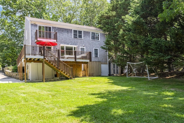 908 W Falmouth Hwy, Falmouth, MA 02540 - back of property with stairway, a wooden deck, a storage unit, a yard, and a balcony