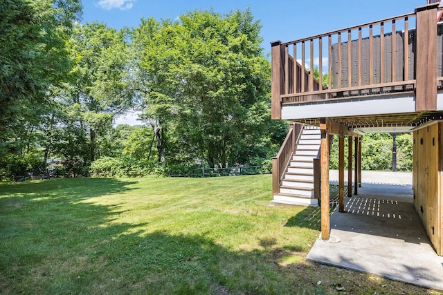 908 W Falmouth Hwy, Falmouth, MA 02540 - view of grassy yard featuring stairway, a deck, and a patio area