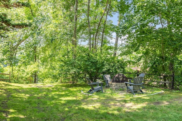 908 W Falmouth Hwy, Falmouth, MA 02540 - view of green lawn with an outdoor fire pit