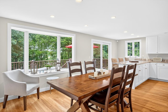 908 W Falmouth Hwy, Falmouth, MA 02540 - dining area with light wood-style floors and recessed lighting