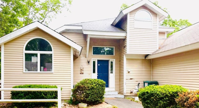 62 Musket Ln, Mashpee, MA 02649 - view of exterior entry with roof with shingles