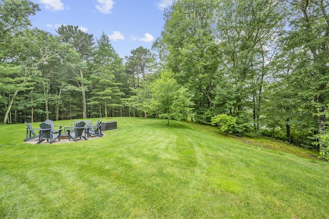 95 Red Brook Rd, Waquoit, MA 02536 - view of grassy yard featuring an outdoor fire pit