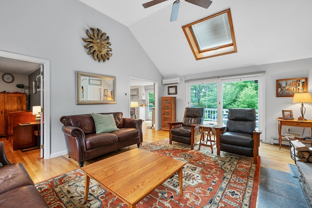 95 Red Brook Rd, Waquoit, MA 02536 - living room with a ceiling fan, an AC wall unit, a skylight, high vaulted ceiling, and wood finished floors