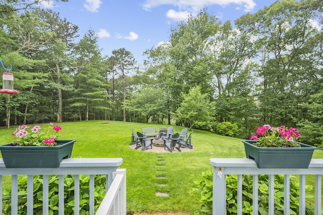 95 Red Brook Rd, Waquoit, MA 02536 - view of green lawn with an outdoor fire pit
