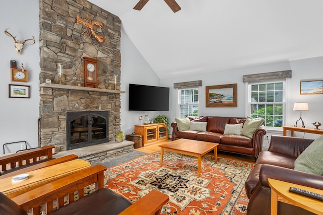95 Red Brook Rd, Waquoit, MA 02536 - living area with a ceiling fan, a stone fireplace, high vaulted ceiling, and wood finished floors