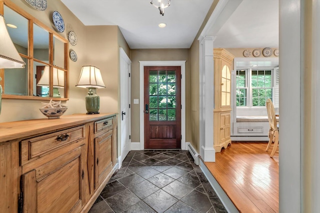 37 Tobisset St, Mashpee, MA 02649 - foyer entrance with baseboard heating, decorative columns, and recessed lighting