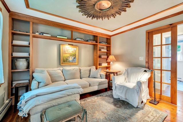 37 Tobisset St, Mashpee, MA 02649 - living area with wood-type flooring, baseboard heating, ornamental molding, and a tray ceiling