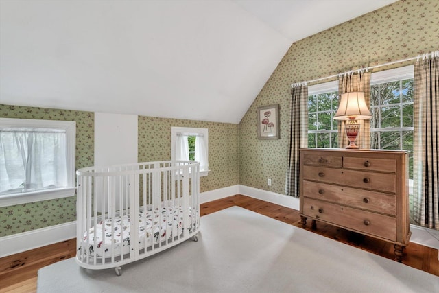 37 Tobisset St, Mashpee, MA 02649 - bedroom featuring vaulted ceiling, wood finished floors, and wallpapered walls