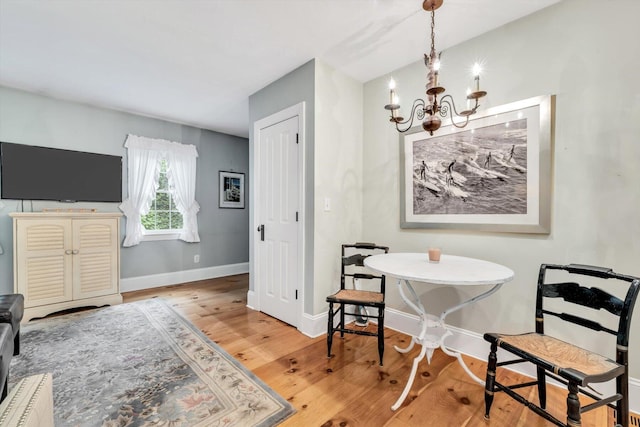 37 Tobisset St, Mashpee, MA 02649 - dining room with a chandelier and wood finished floors