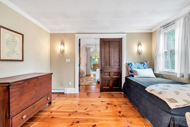 37 Tobisset St, Mashpee, MA 02649 - bedroom with light wood-style flooring, a baseboard radiator, and crown molding